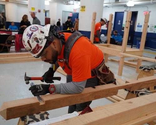 carpenter training with chisel and hammer